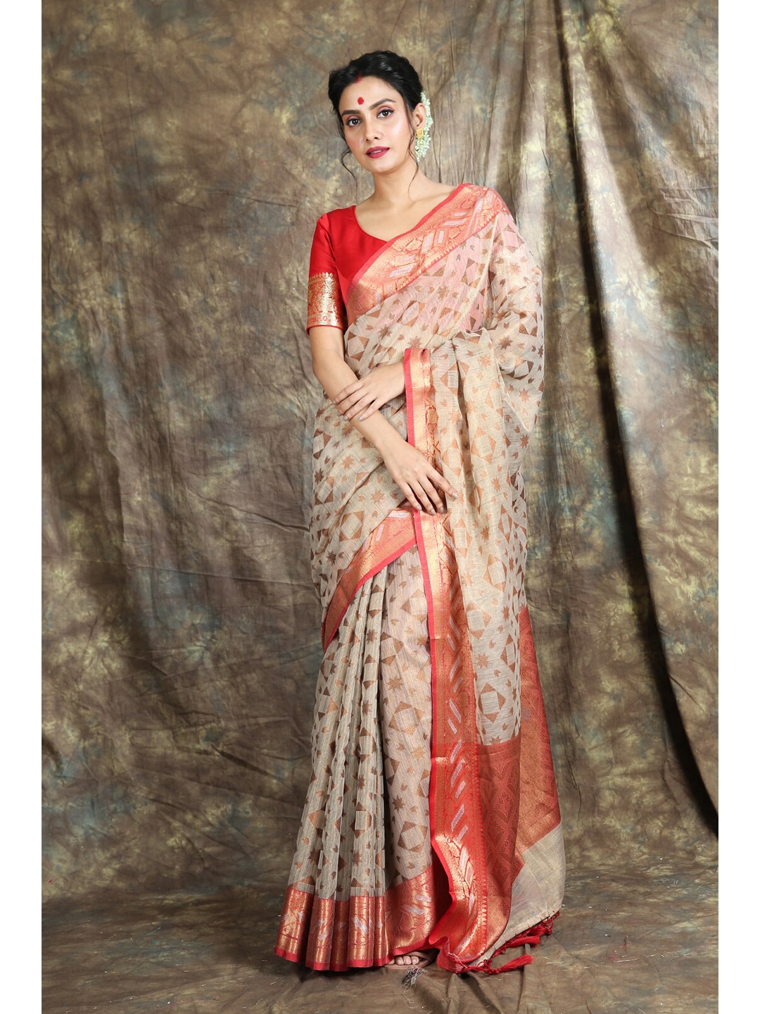 

Charukriti Orange & Gold-Toned Woven Design Zari Tissue Saree