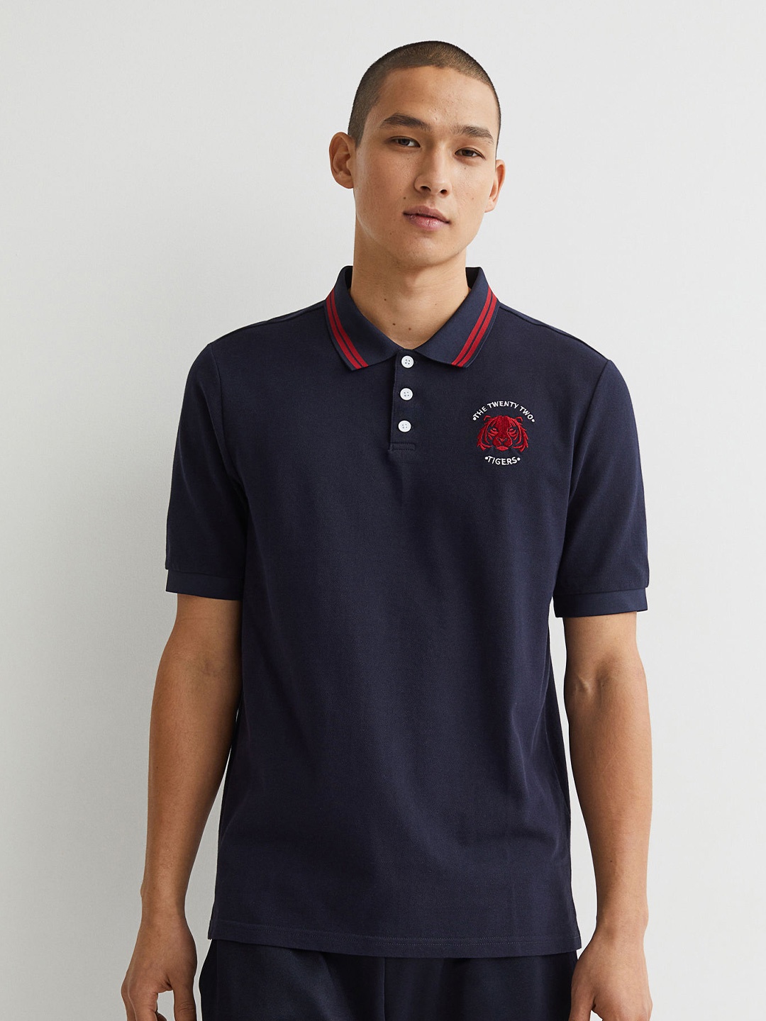 

H&M Men Blue Cotton Slim Fit Embroidered Pique Polo Shirt