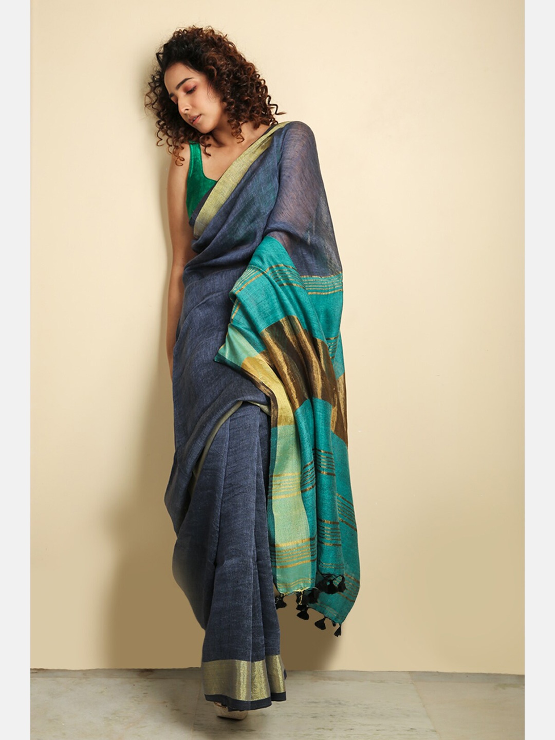 

Charukriti Blue & Green Woven Design Zari Pure Linen Saree
