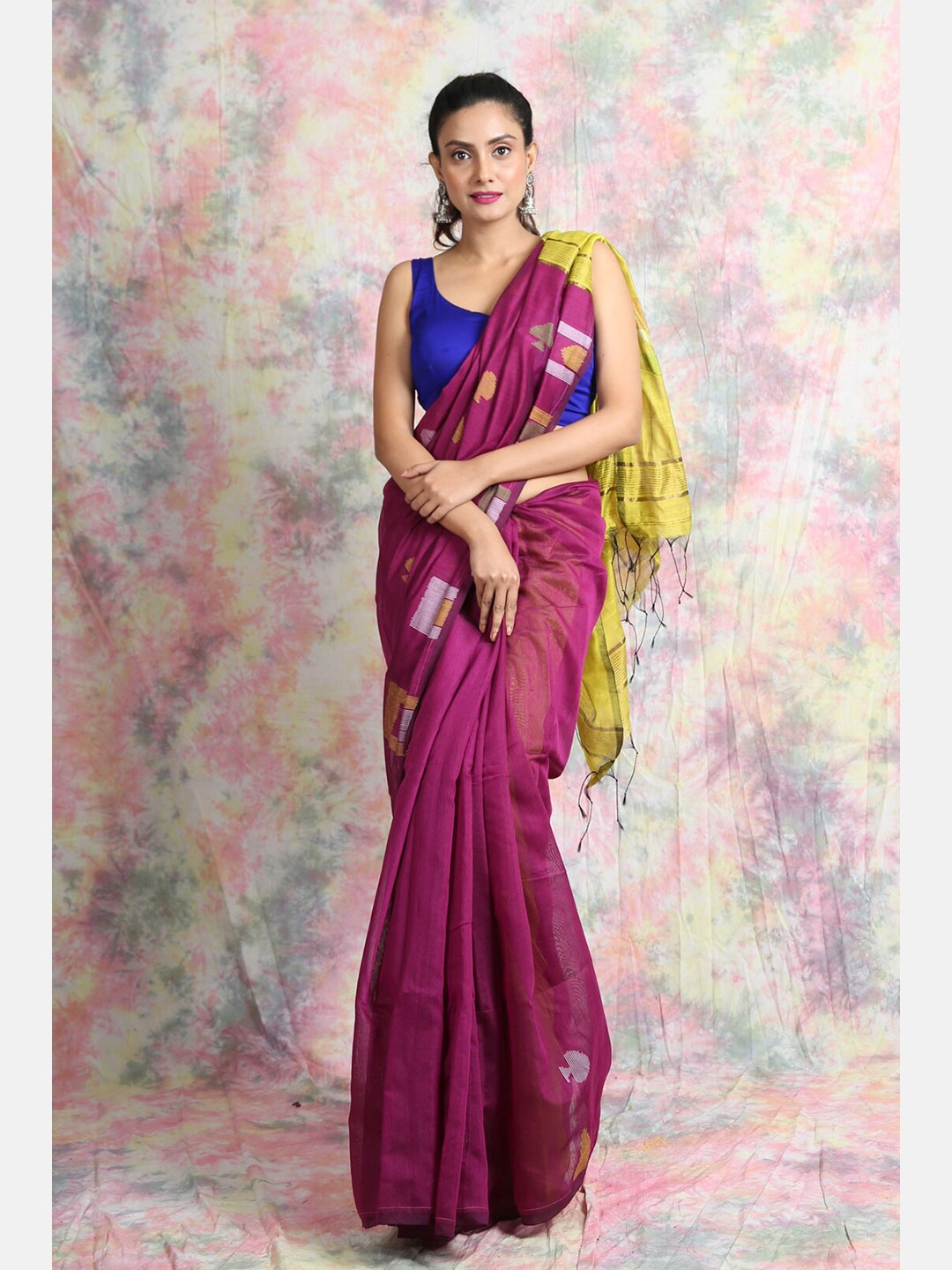 

Charukriti Magenta & Yellow Ethnic Motifs Saree