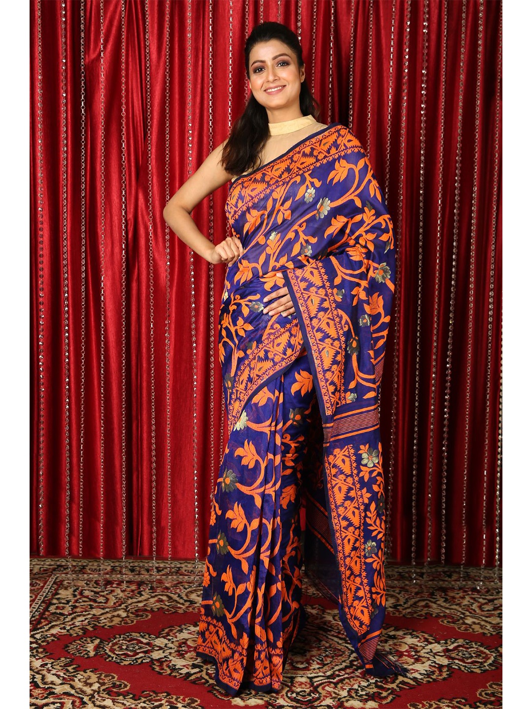 

Charukriti Blue & Orange Floral Silk Cotton Jamdani Saree