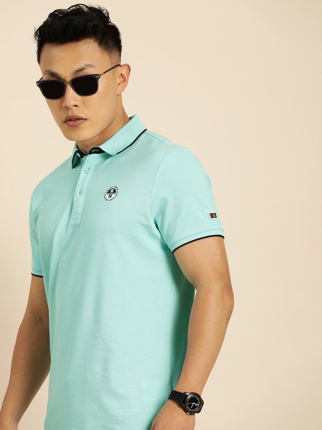 

Being Human Men Blue Solid Polo Collar T-shirt