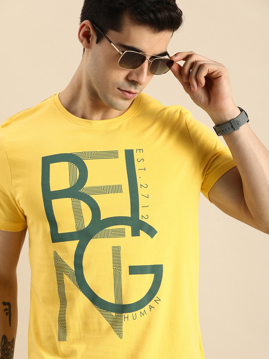 

Being Human Clothing Men Yellow Typography Printed Slim Fit Pure Cotton Casual T-shirt