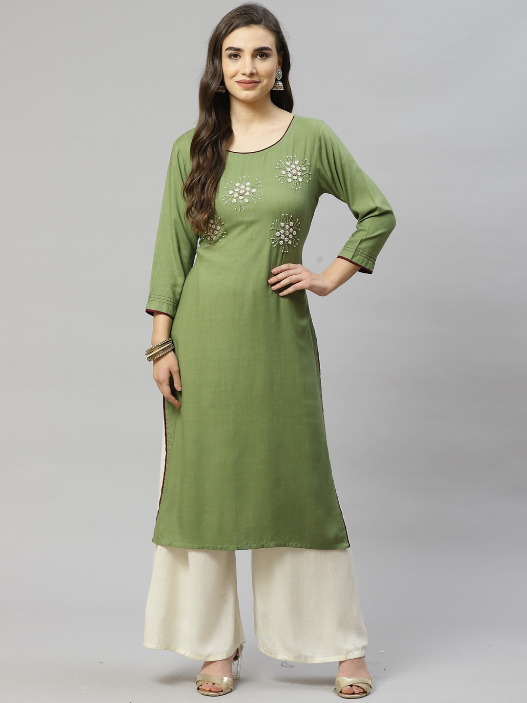 

KALINI Women Green Embellished Mirror Work Kurta