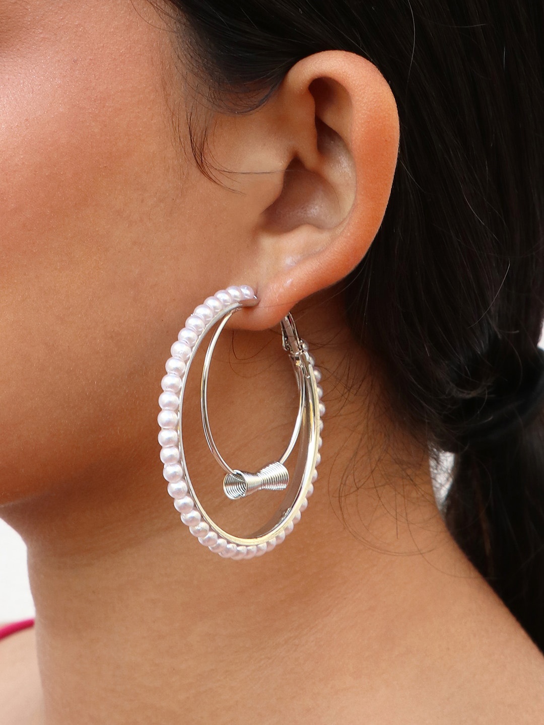 

Ayesha Silver-Toned Oversized Pearl Studded Circular Double Layered Hoop Earrings