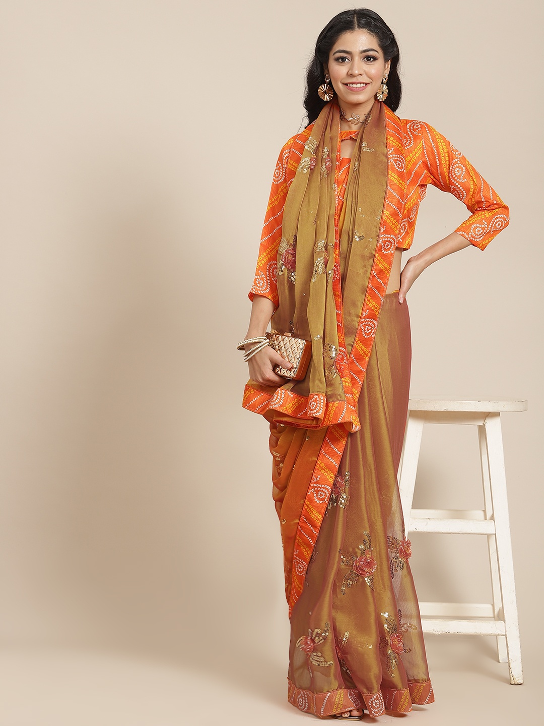

SERONA FABRICS Women Yellow & Orange Floral Sequinned Saree