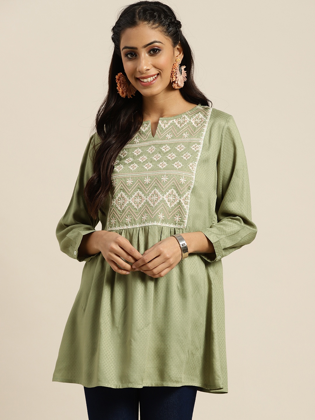 

Sangria Green & White Embroidered Kurti