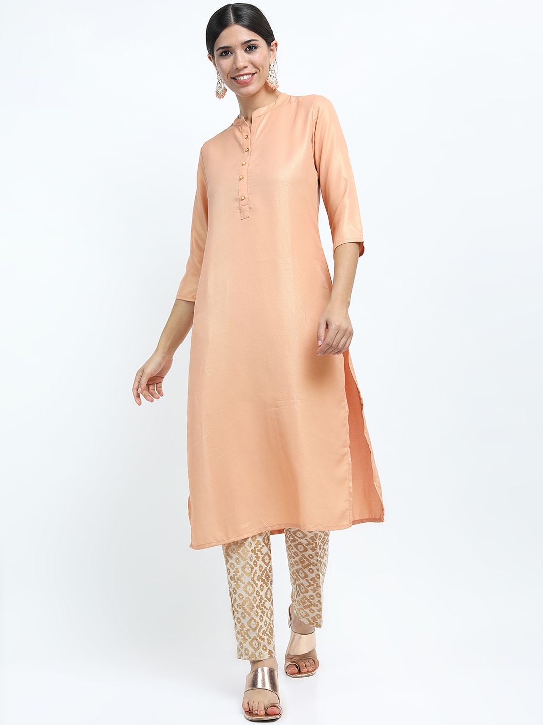 

Vishudh Women Orange Solid Straight Kurta