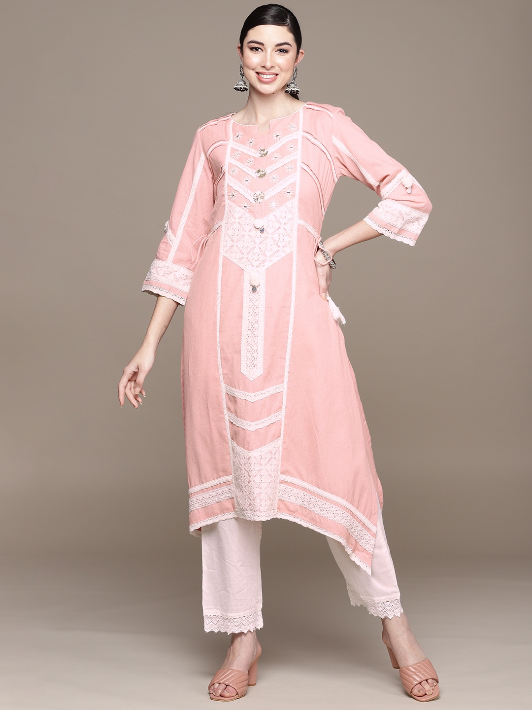 

Ishin Women Pink & White Floral Embroidered Thread Work Asymmetric Cotton Kurta