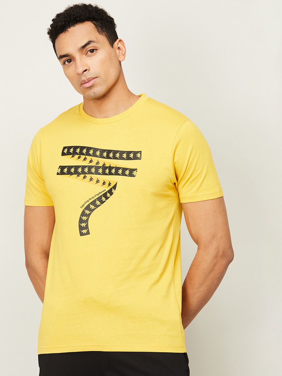 

Kappa Men Yellow Graphic Printed Cotton Regular Fit Training or Gym T-shirt