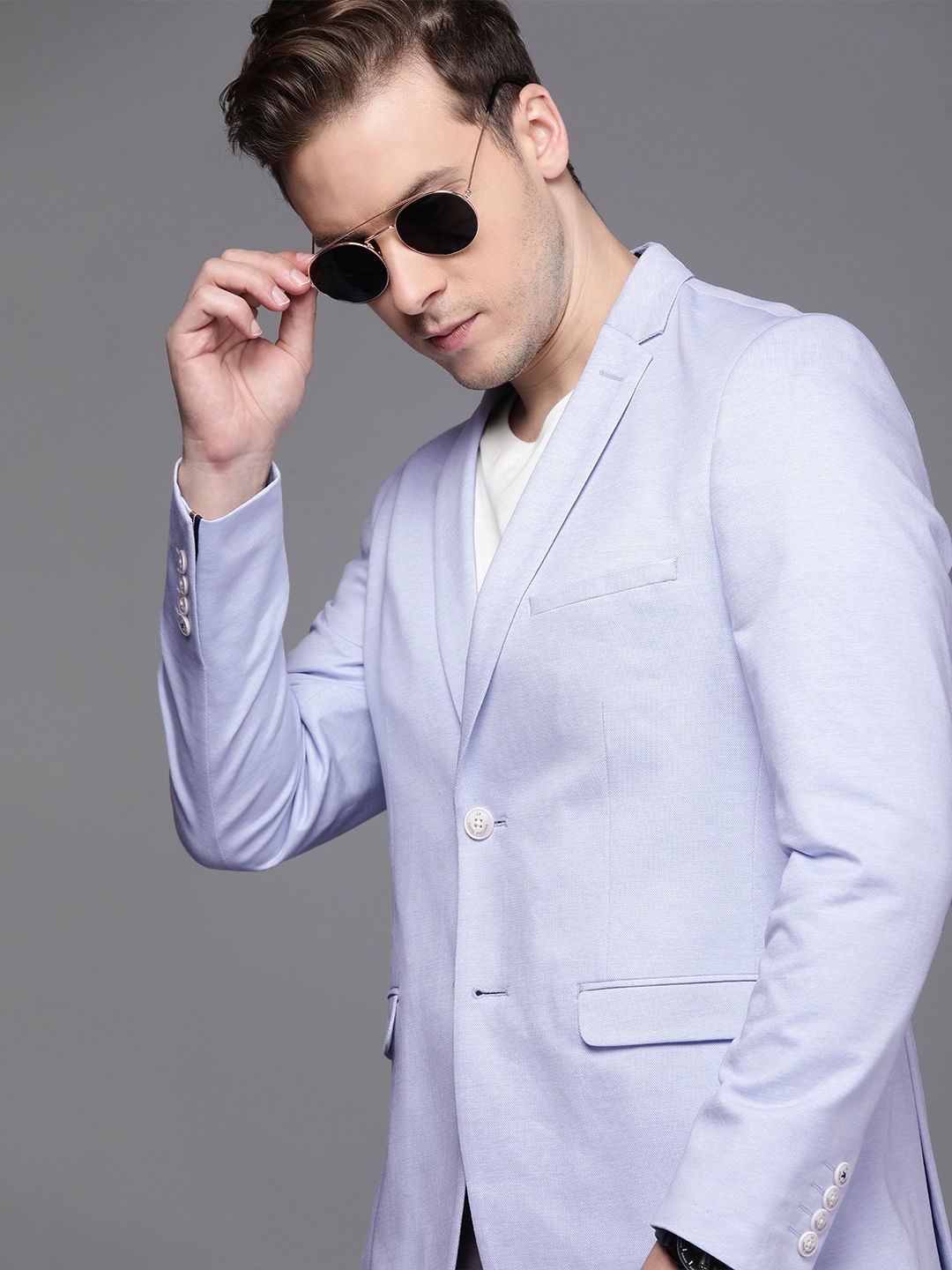

Louis Philippe Sport Men Light Blue Self-Design Single-Breasted Super Slim-Fit Blazer