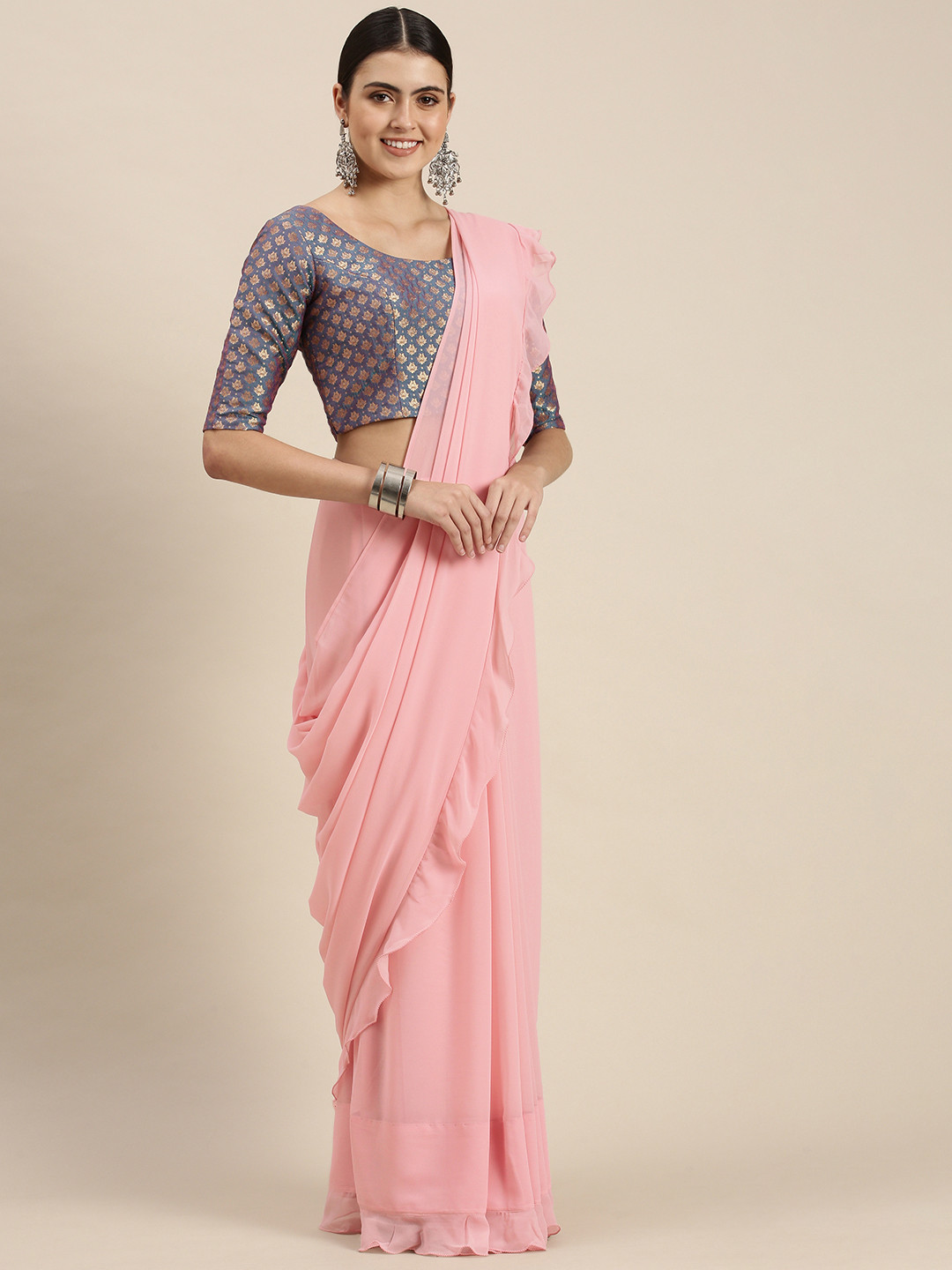 

Ethnovog Pink Solid Ruffle Border Saree