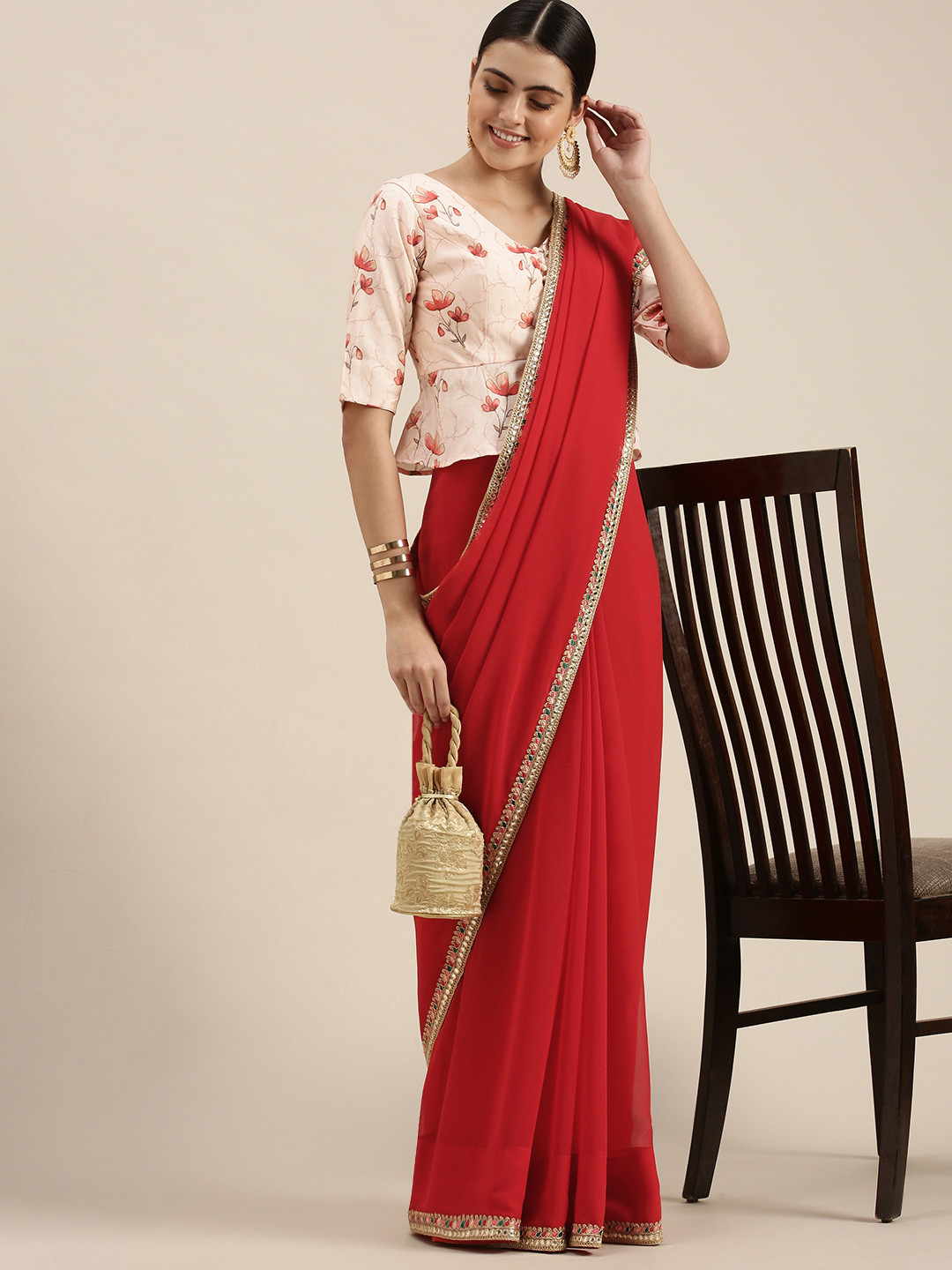 

Ethnovog Red Solid Embroidered Border Saree