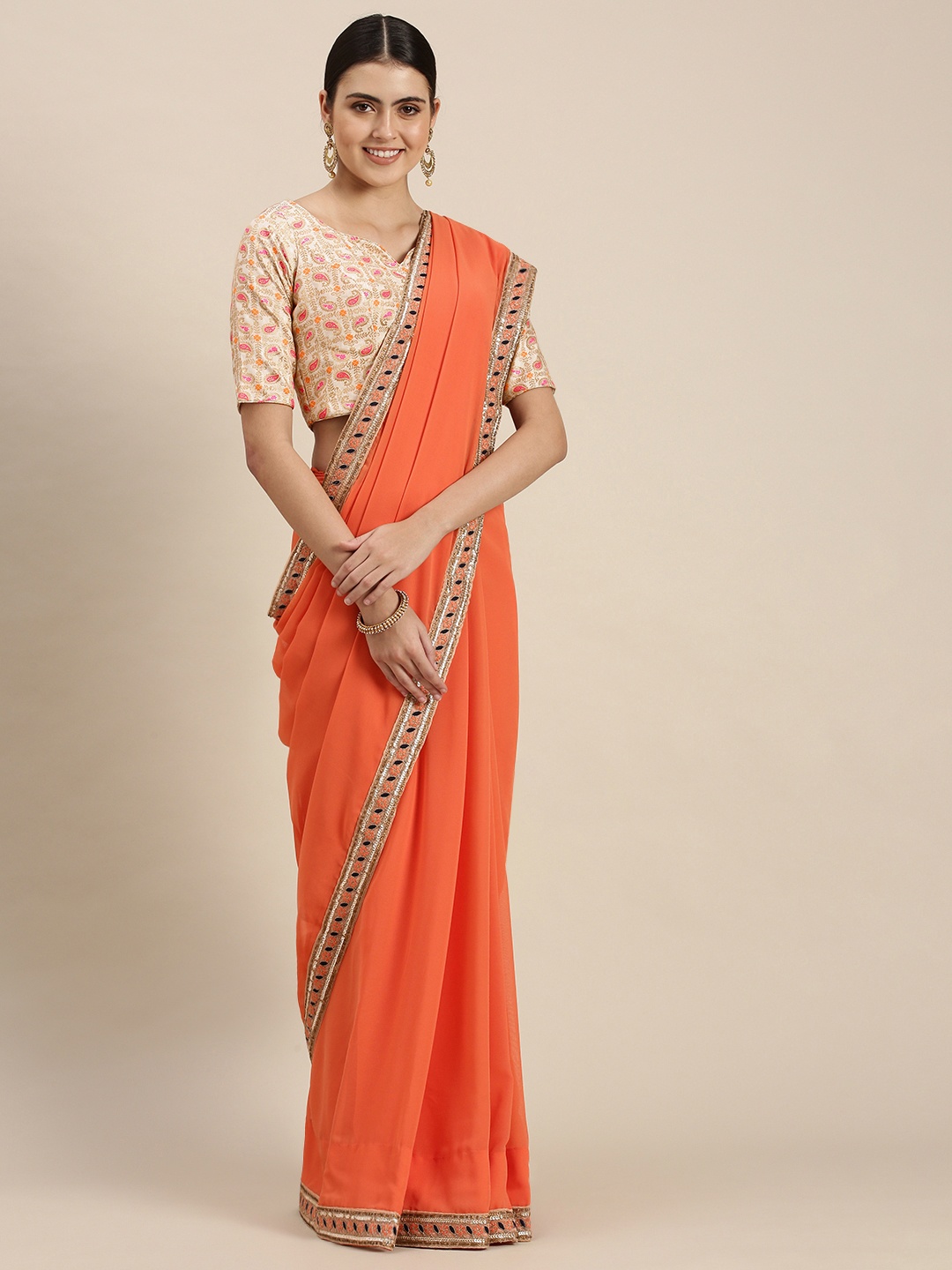 

Ethnovog Orange Solid Embroidered Border Saree