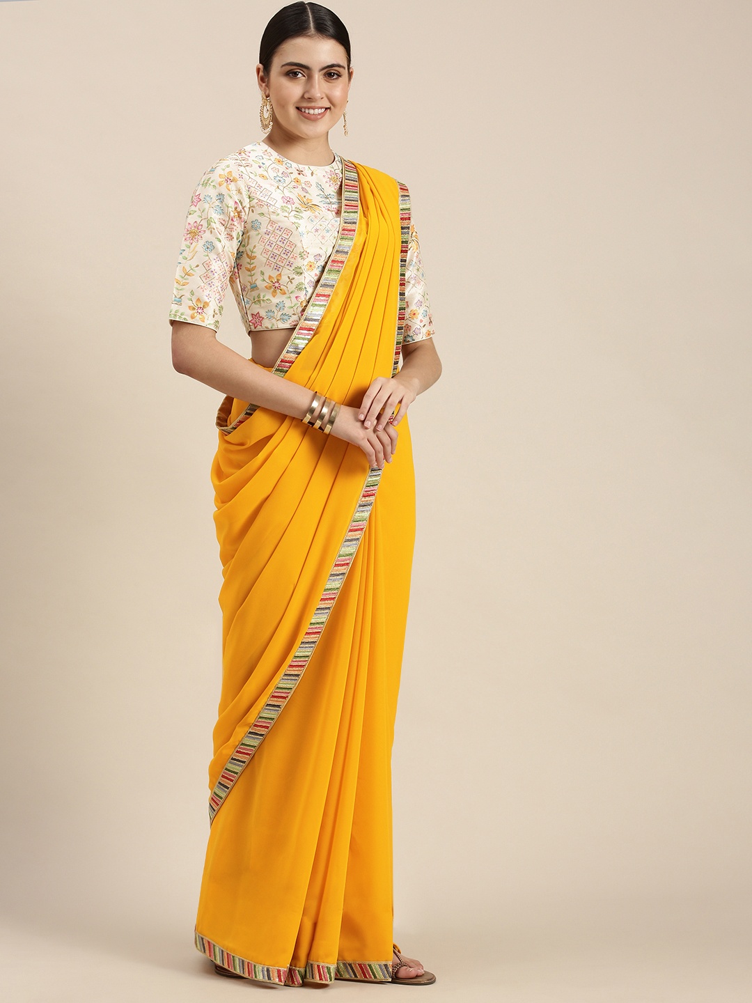 

Ethnovog Mustard Yellow Solid Georgette Saree