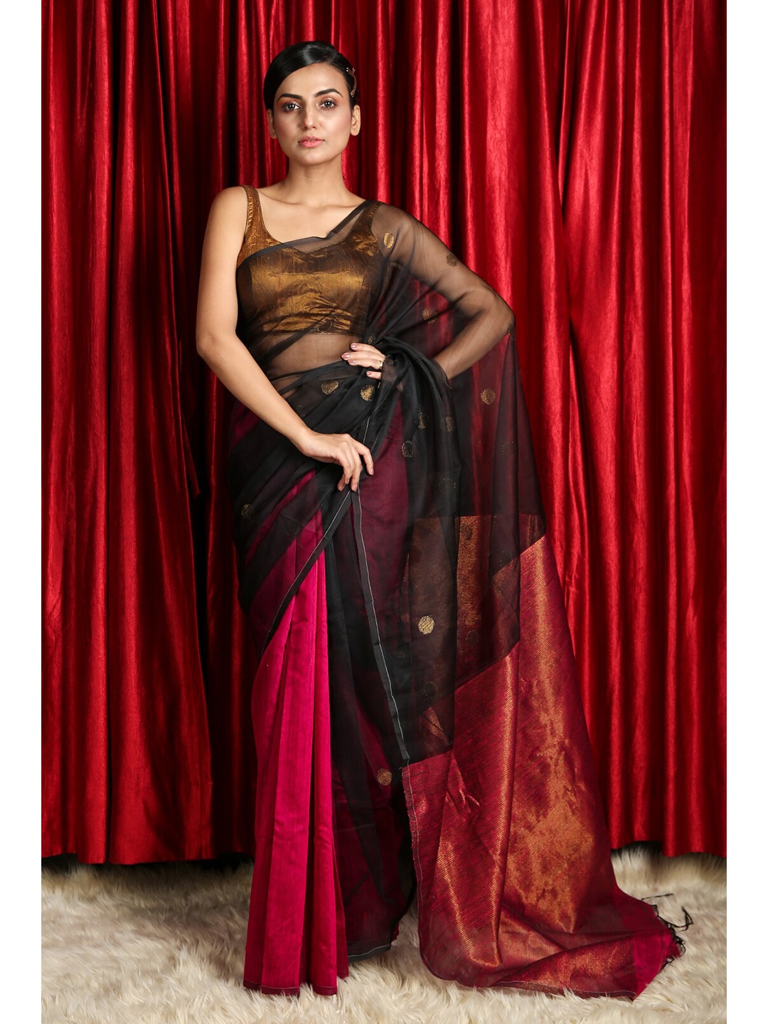 

Charukriti Black & Red Ethnic Motifs Silk Blend Saree