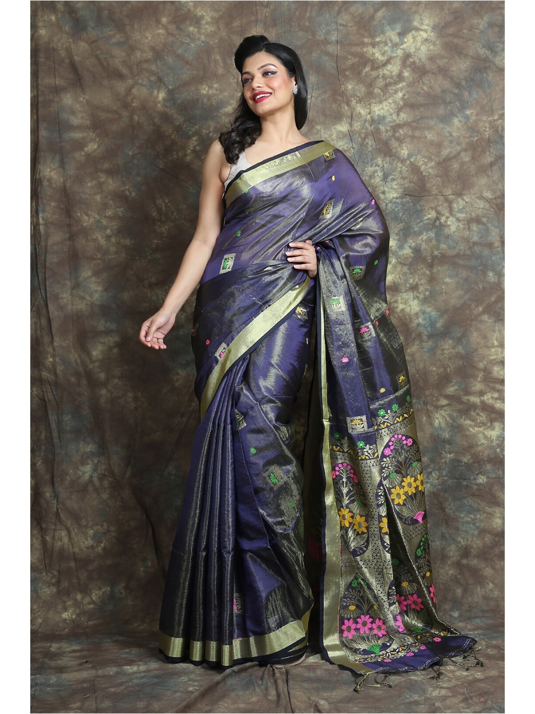 

Charukriti Blue & Green Ethnic Motifs Zari Tissue Saree