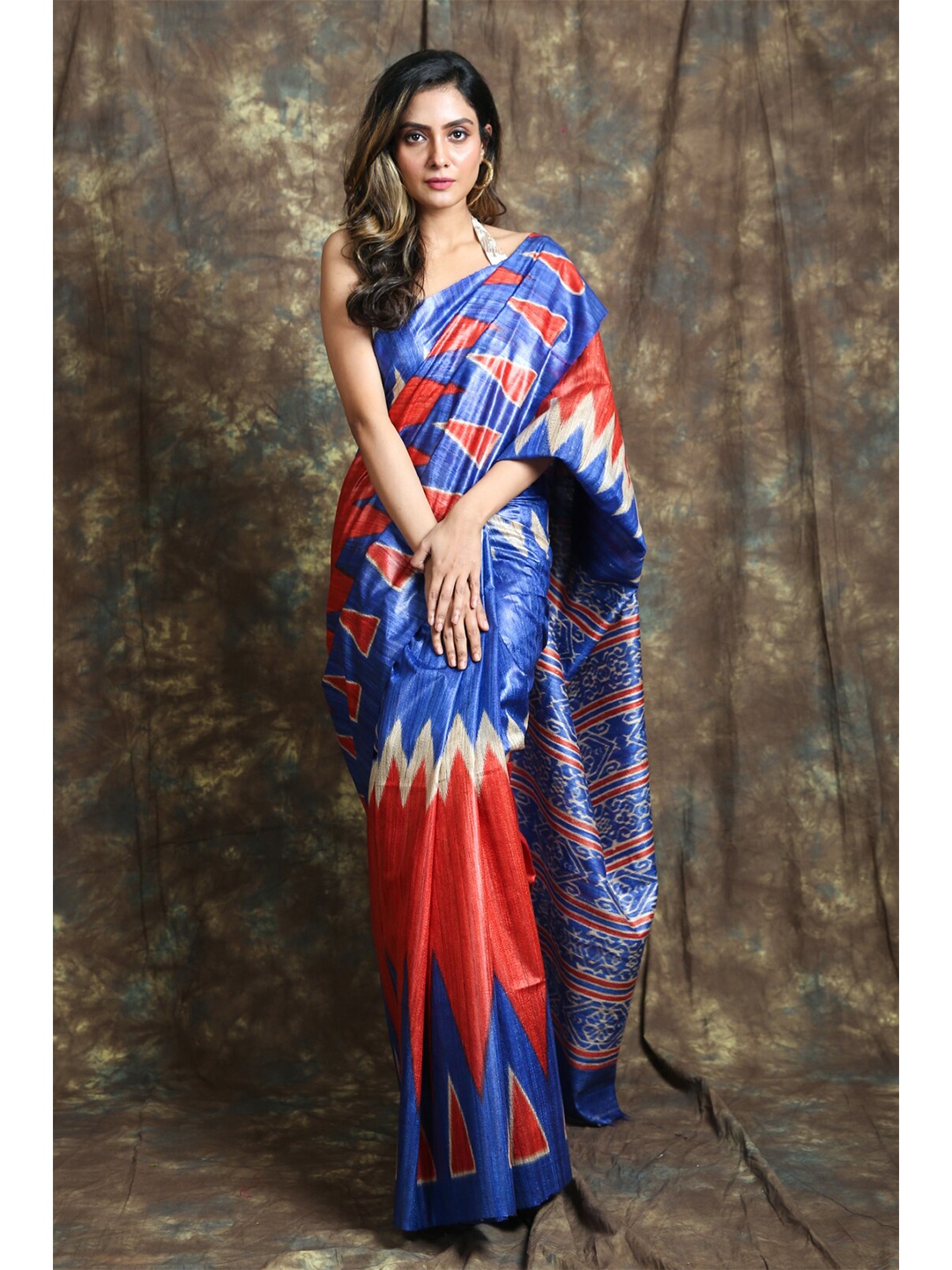 

Charukriti Blue & Red Pure Silk Saree