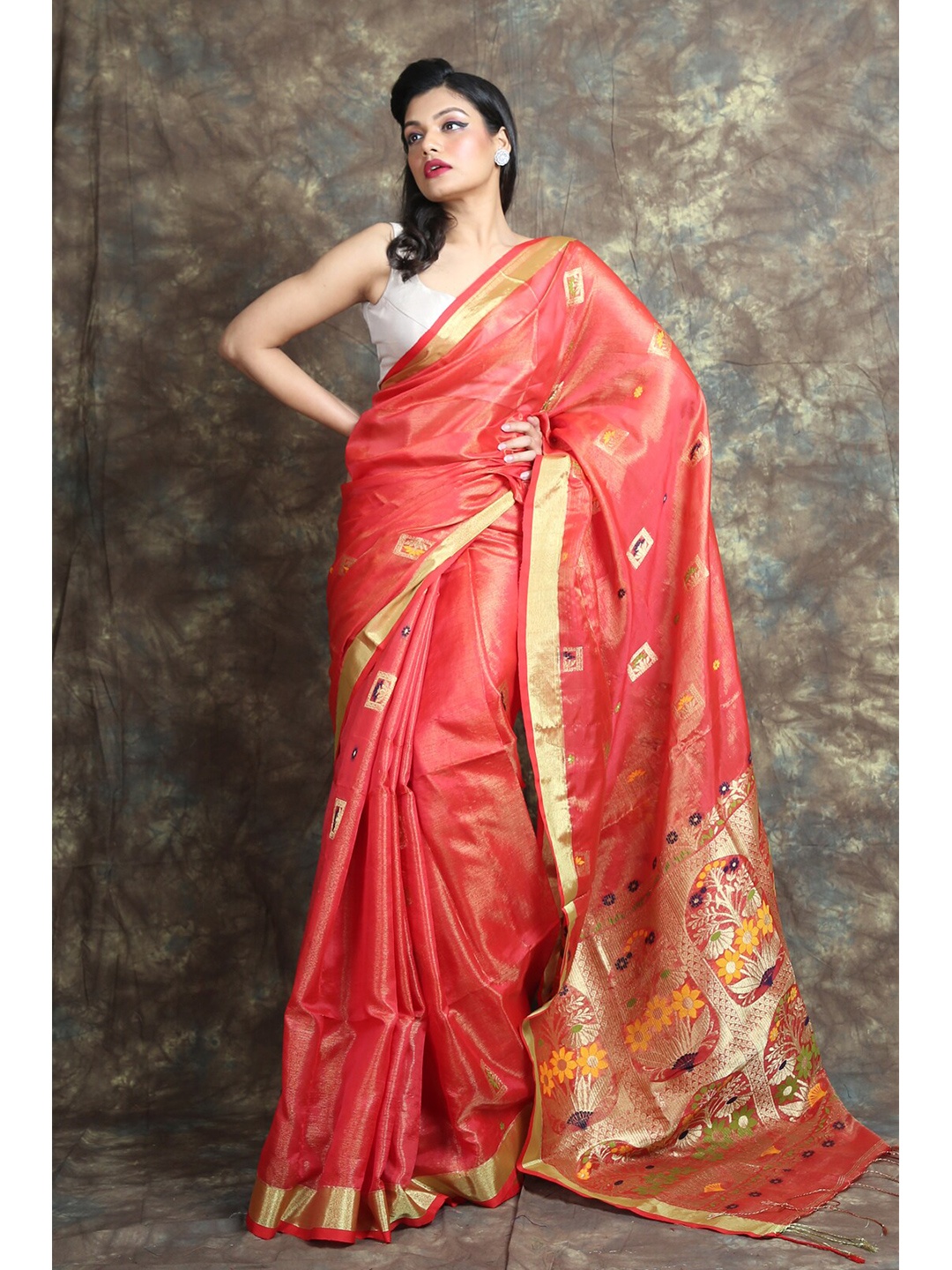 

Charukriti Orange & Gold-Toned Woven Design Zari Tissue Saree