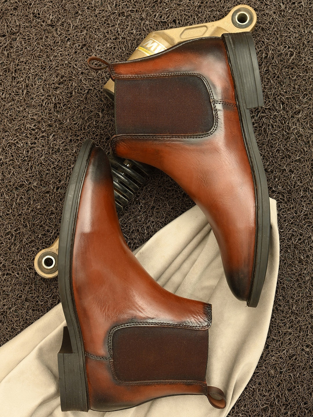 

Hirels Men Brown Textured Leather Flat Boots