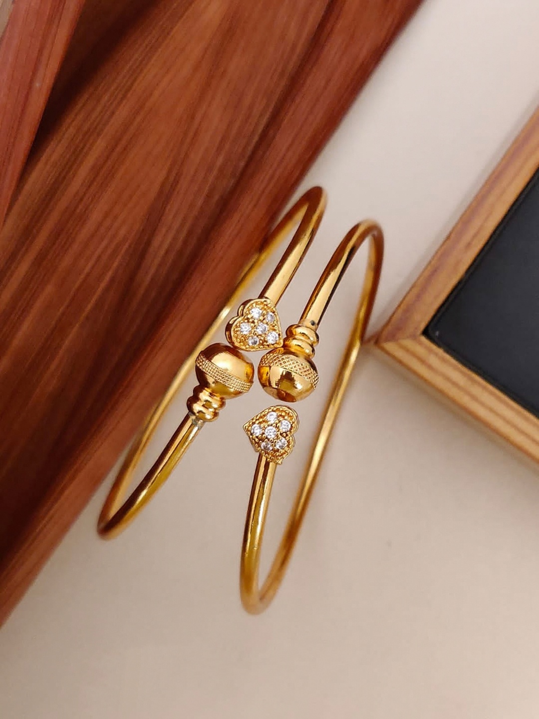 

Shining Diva Set Of 2 Gold-Plated White Stone-Studded Bangles