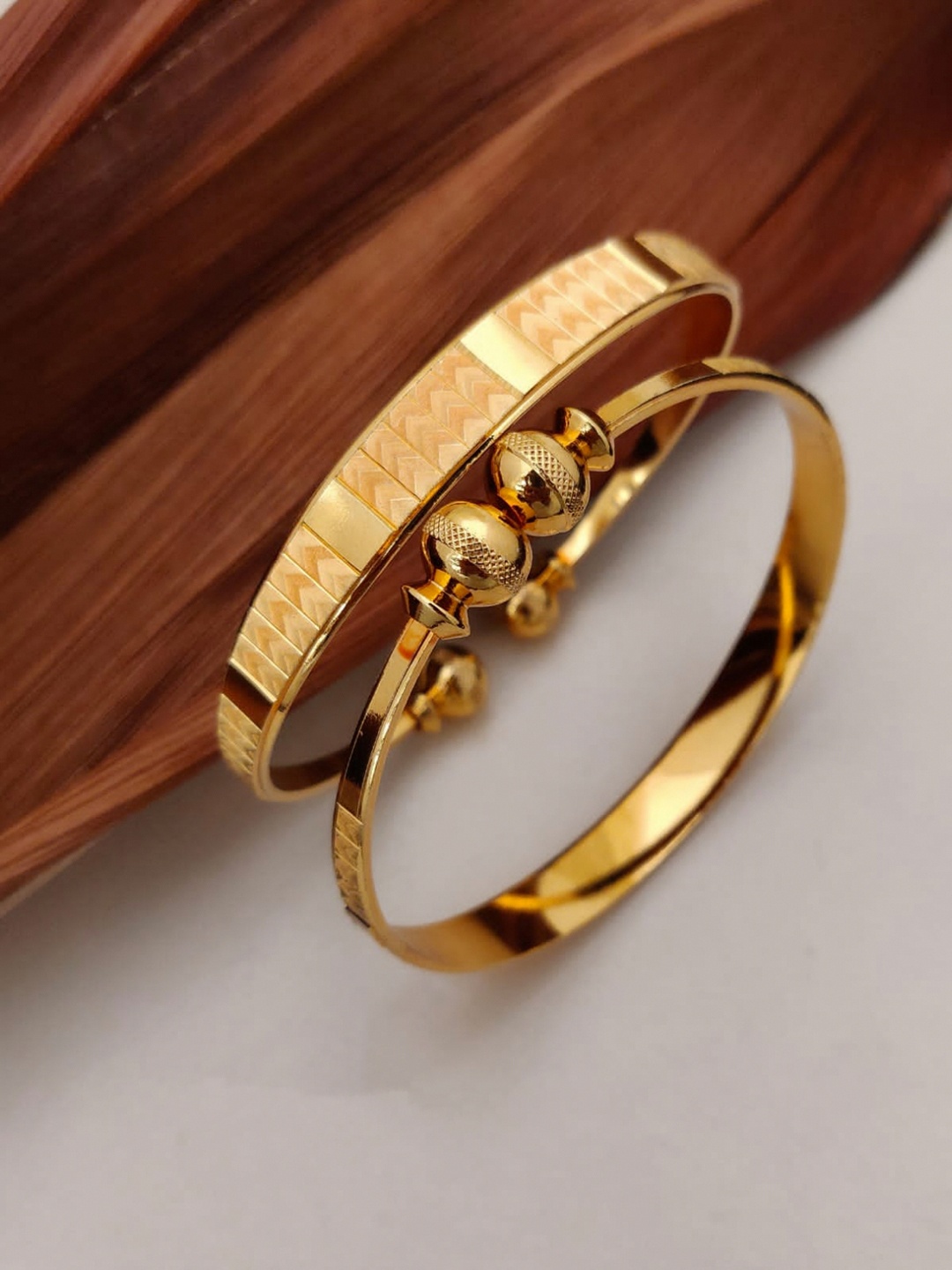 

Shining Diva Set Of 2 Gold-Plated Stone-Studded Adjustable Bangles