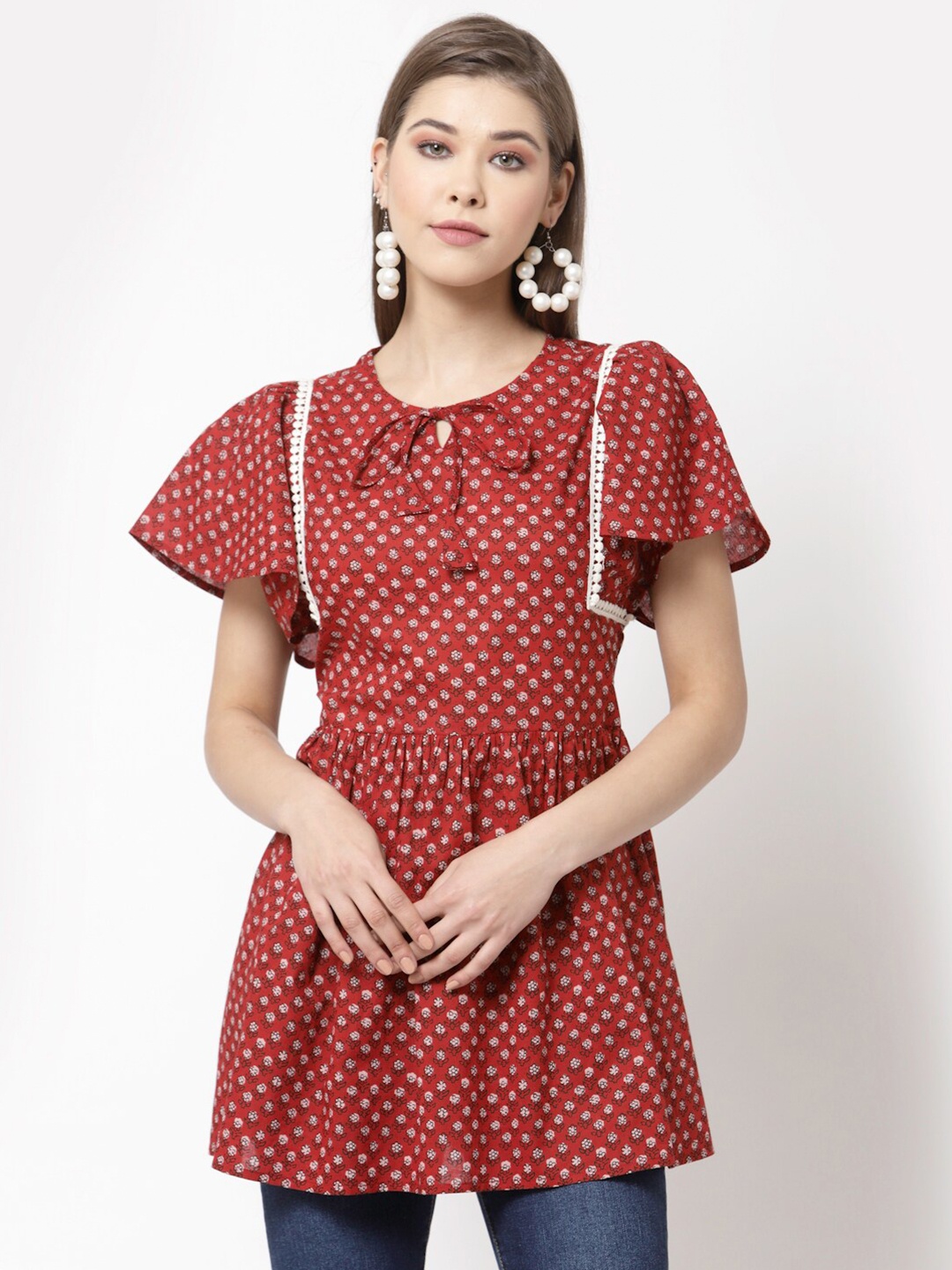 

Myshka Maroon Floral Print Tie-Up Neck Empire Longline Top