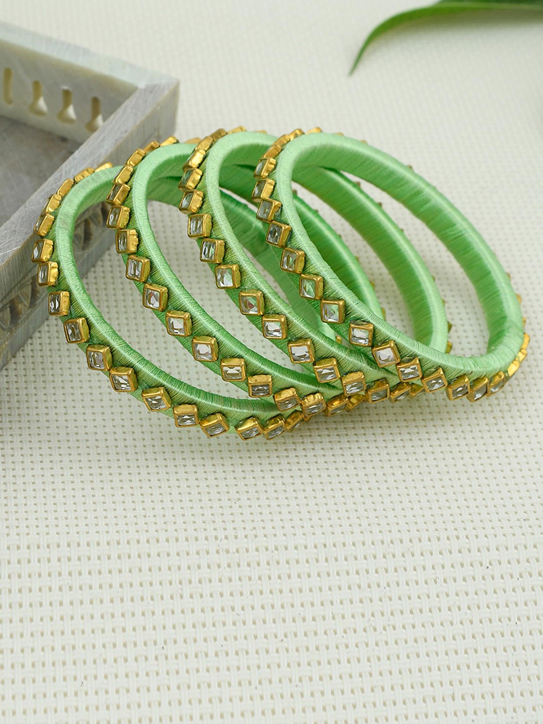 

Silvermerc Designs Set Of 4 Gold-Plated & Green Stone Studded Bangles