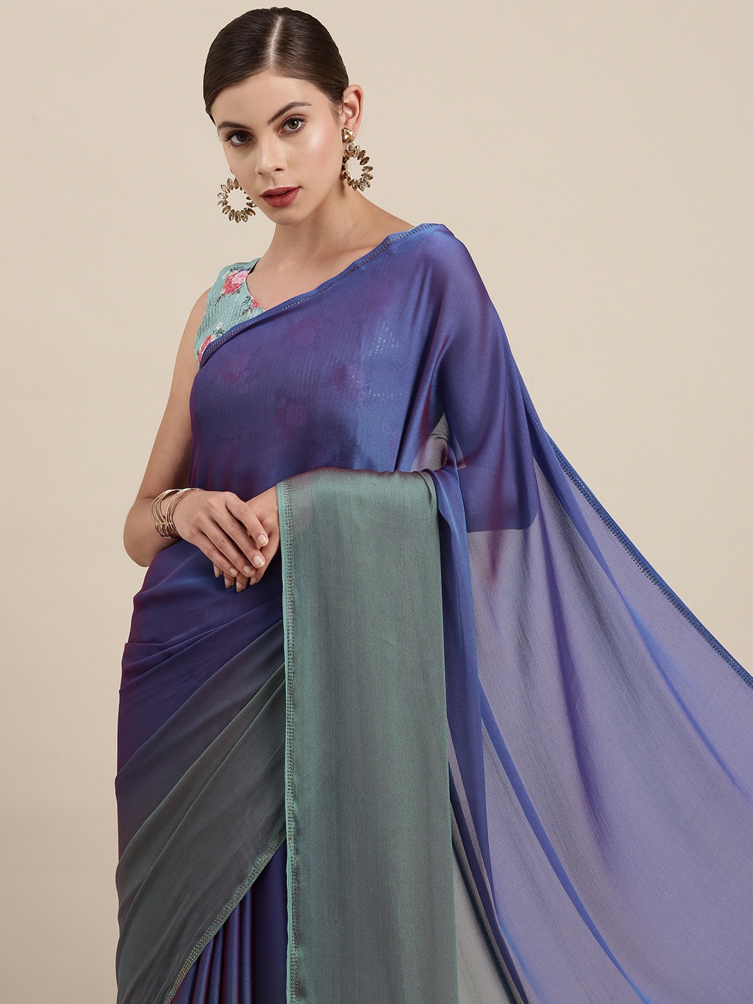 

Mitera Women Blue & Green Ombre Sequinned Pure Chiffon Saree