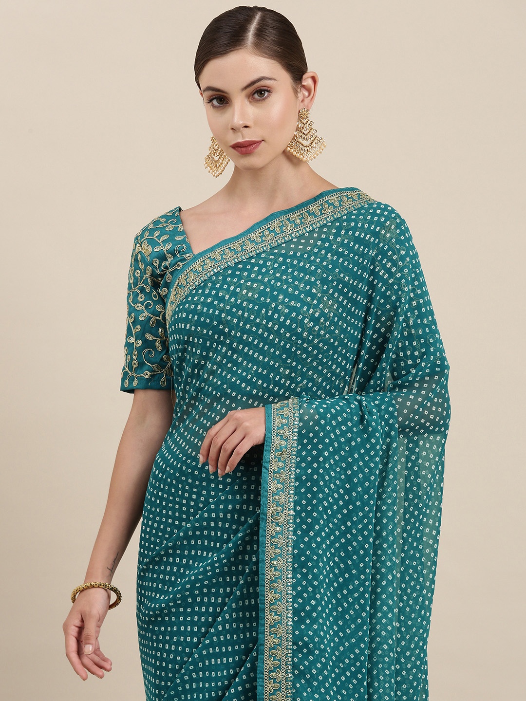 

Mitera Women Teal Blue & White Embroidered Pure Georgette Bandhani Saree