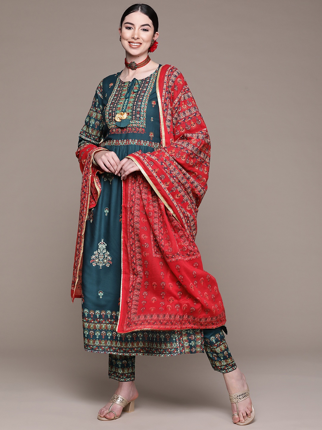 

Anubhutee Women Teal Ethnic Motifs Thread Work Kurta with Palazzos & With Dupatta