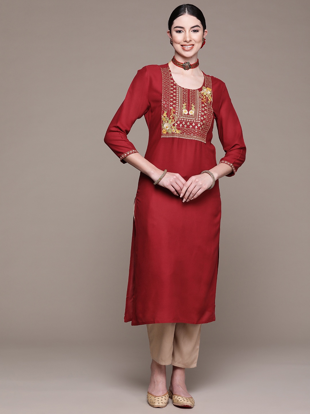 

Anubhutee Women Maroon Yoke Design Thread Work Kurta with Palazzos