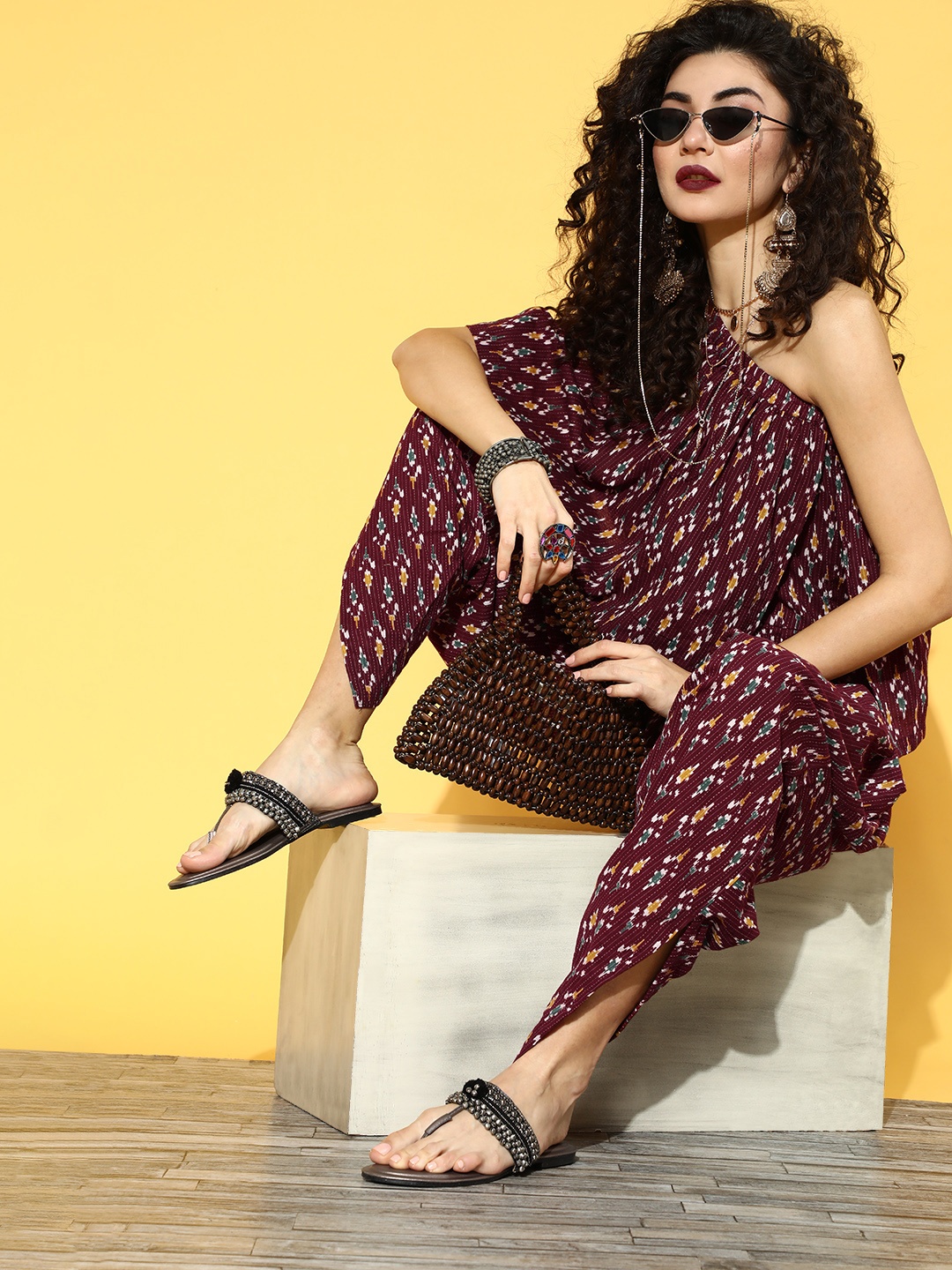 

InWeave Women Chic Brown Printed Asymmetric Hemline Jumpsuit