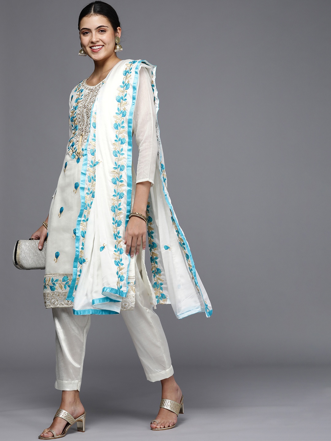 

Mitera White & Blue Embroidered Unstitched Dress Material