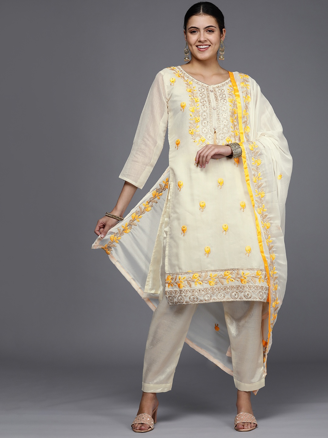 

Mitera Women Off White Embroidered Unstitched Dress Material