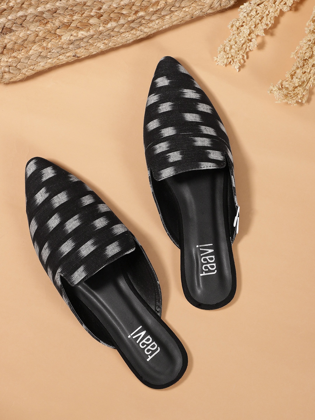 

Taavi Women Black & Off-White Woven Design Mules