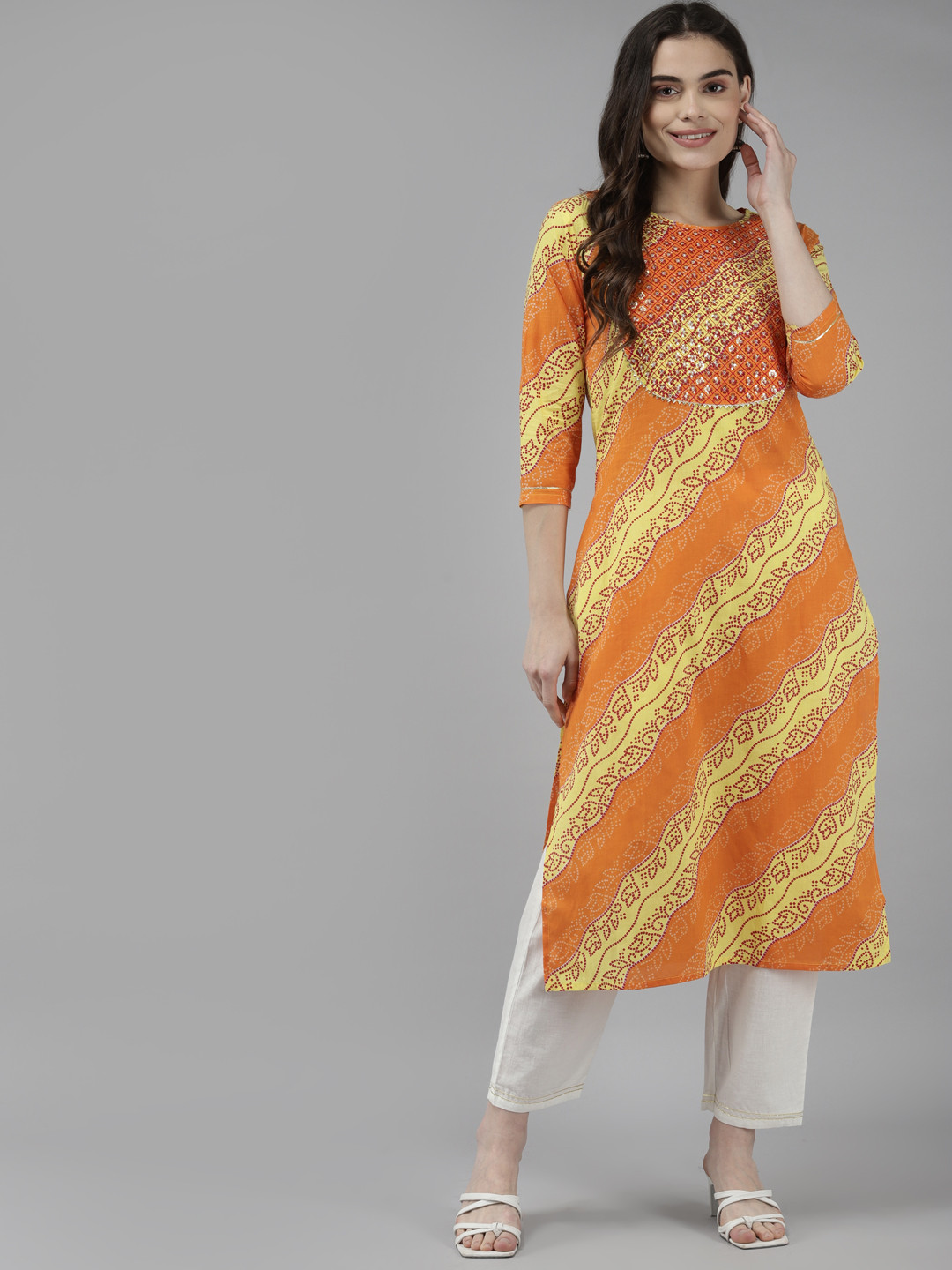

Yufta Women Yellow & Orange Bandhani Gotta Patti Pure Cotton Kurta with Trousers