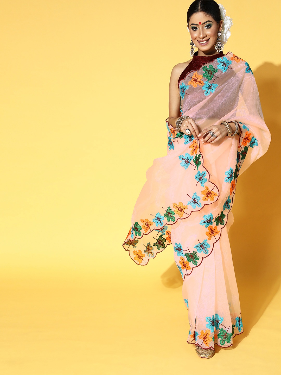 

Saree mall Floral Saree with Embroidered Border, Peach
