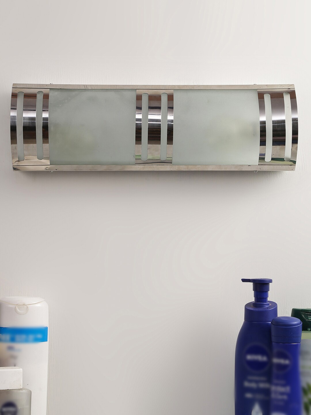 

Devansh Silver Toned & Teal Frosted Glass Bath Light