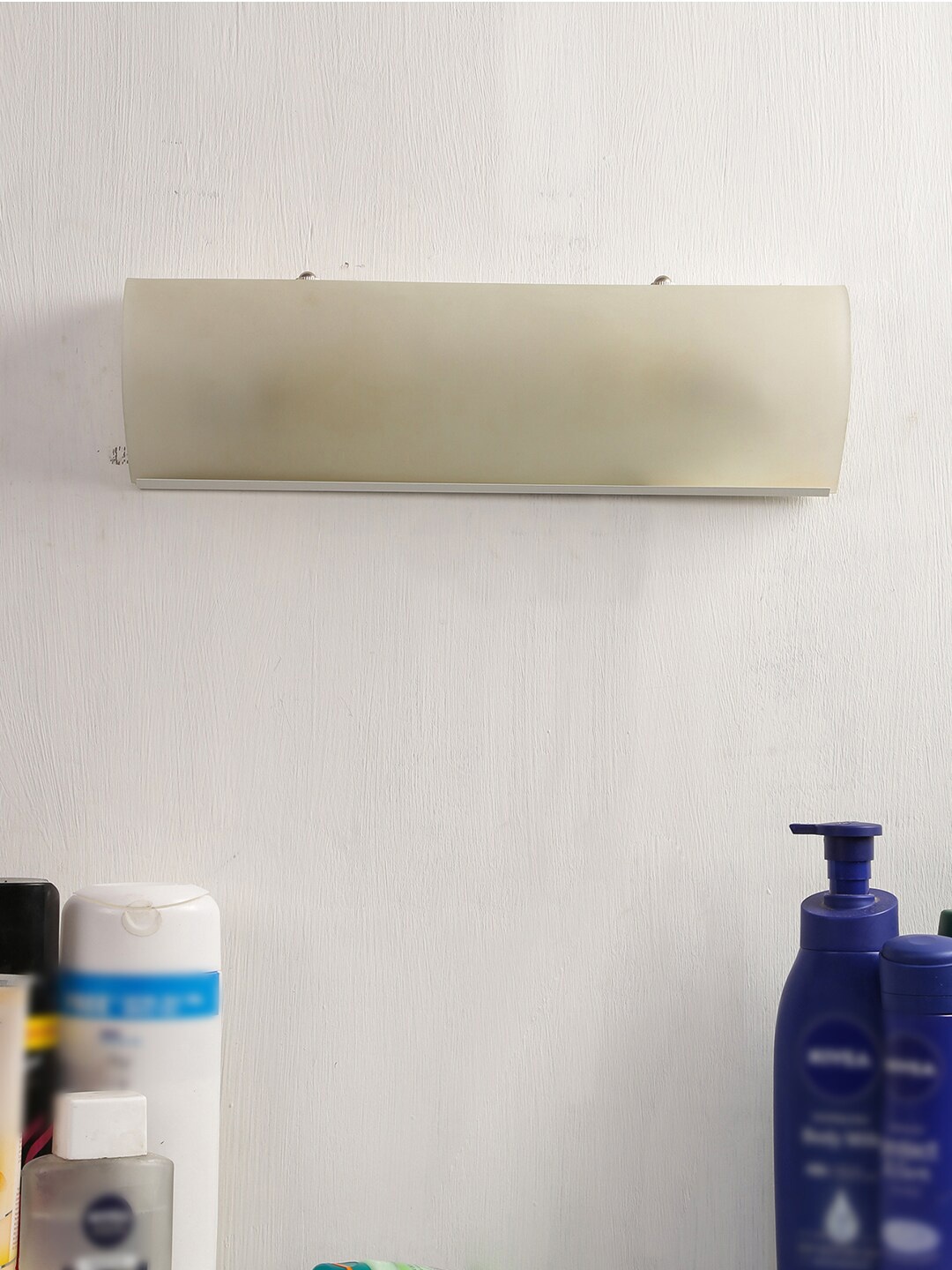 

Devansh Off-White Metal & Frosted Glass Bathroom Light