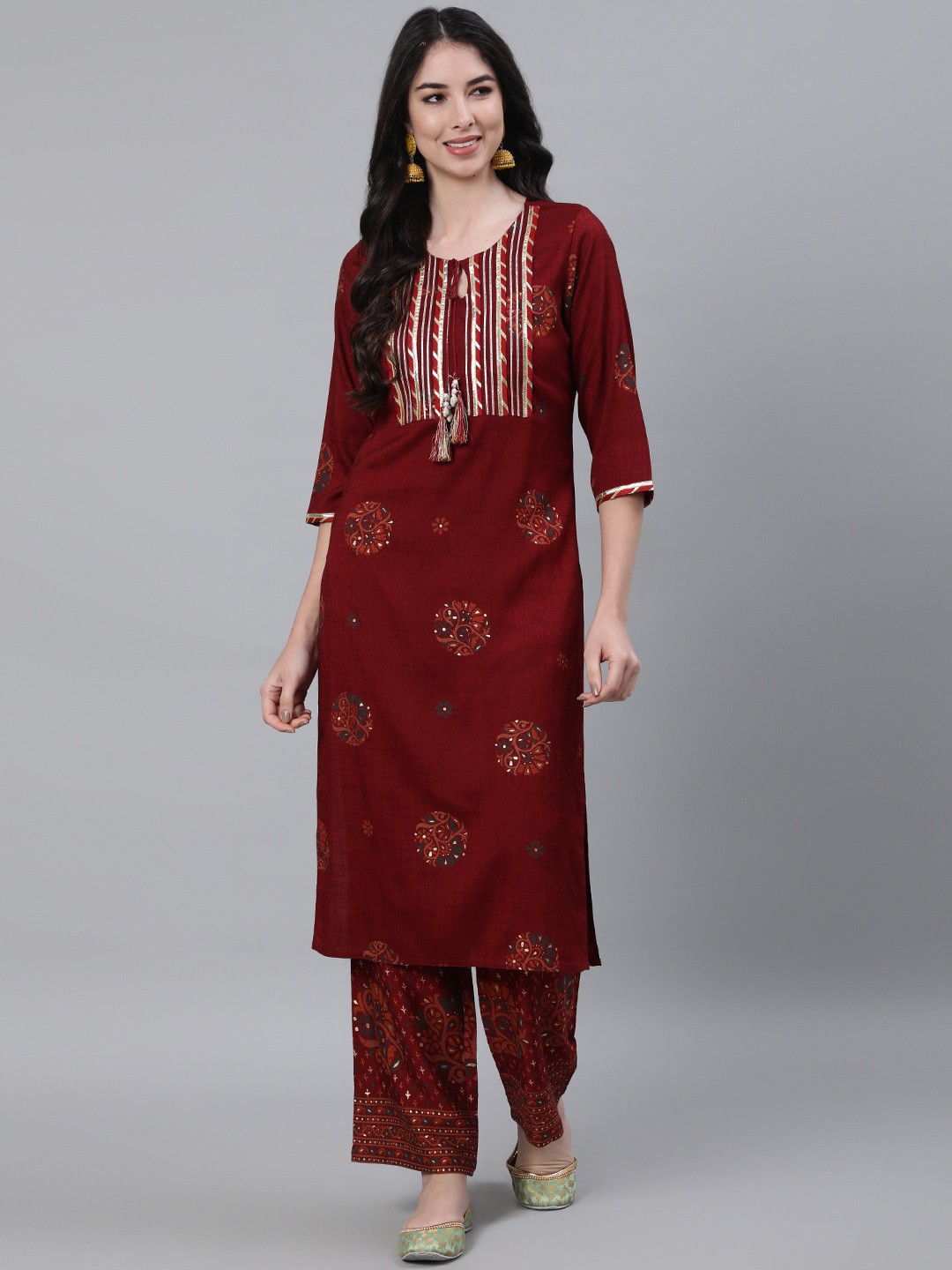 

Jaipur Kurti Women Maroon Ethnic Motifs Embroidered Gotta Patti Kurta with Palazzos