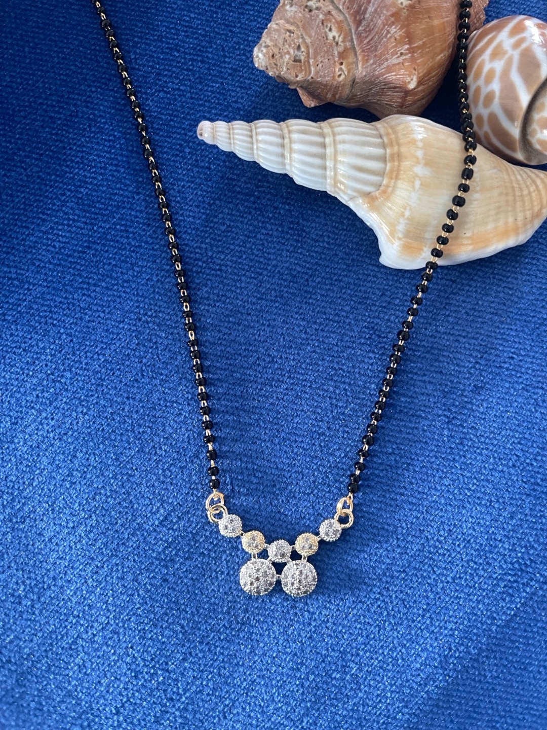 

Digital Dress Room Gold-Plated Black & White Stone Studded & Beaded Mangalsutra