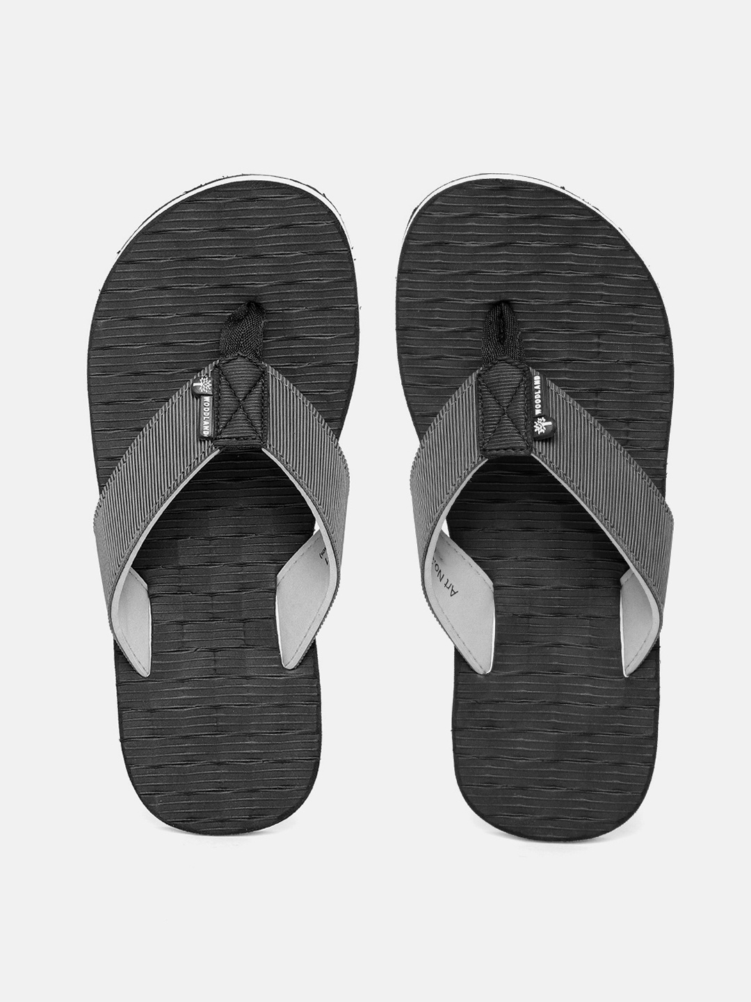 

Woodland Men White & Black Striped Light Weight Thong Flip-Flops