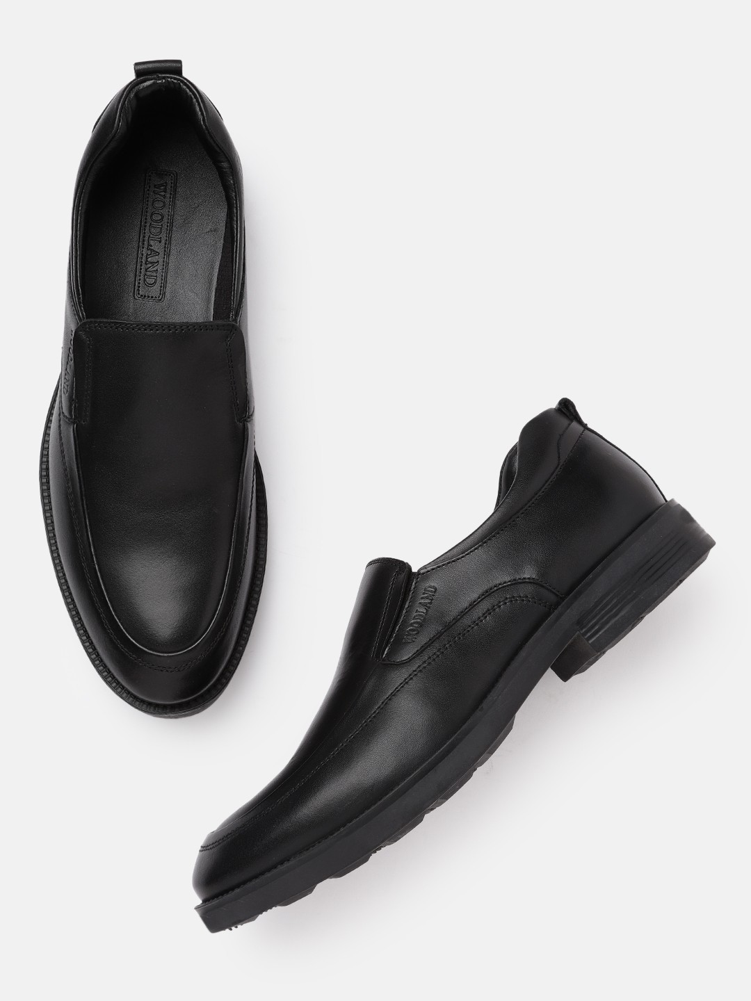 

Woodland Men Black Solid Formal Leather Slip-Ons