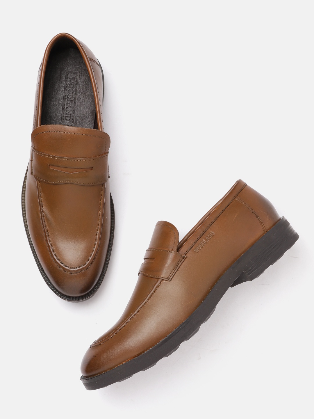 

Woodland Men Brown Solid Leather Penny Loafers