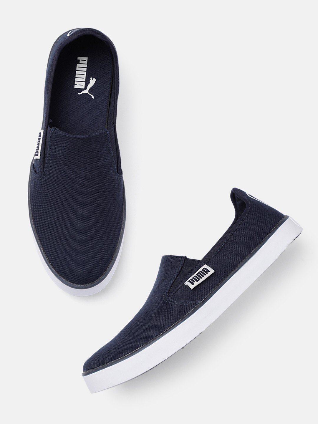

Puma Unisex Blue Solid Slip-On Sneakers