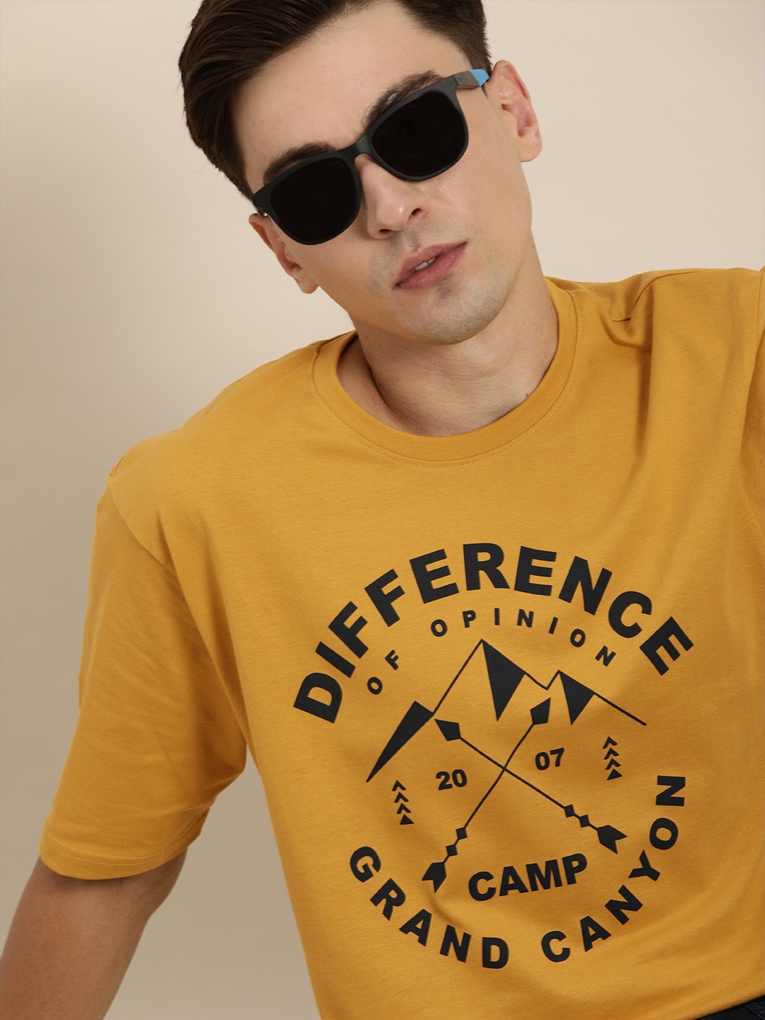 

Difference of Opinion Men Mustard Yellow & Black Typography Pure Cotton Loose T-shirt