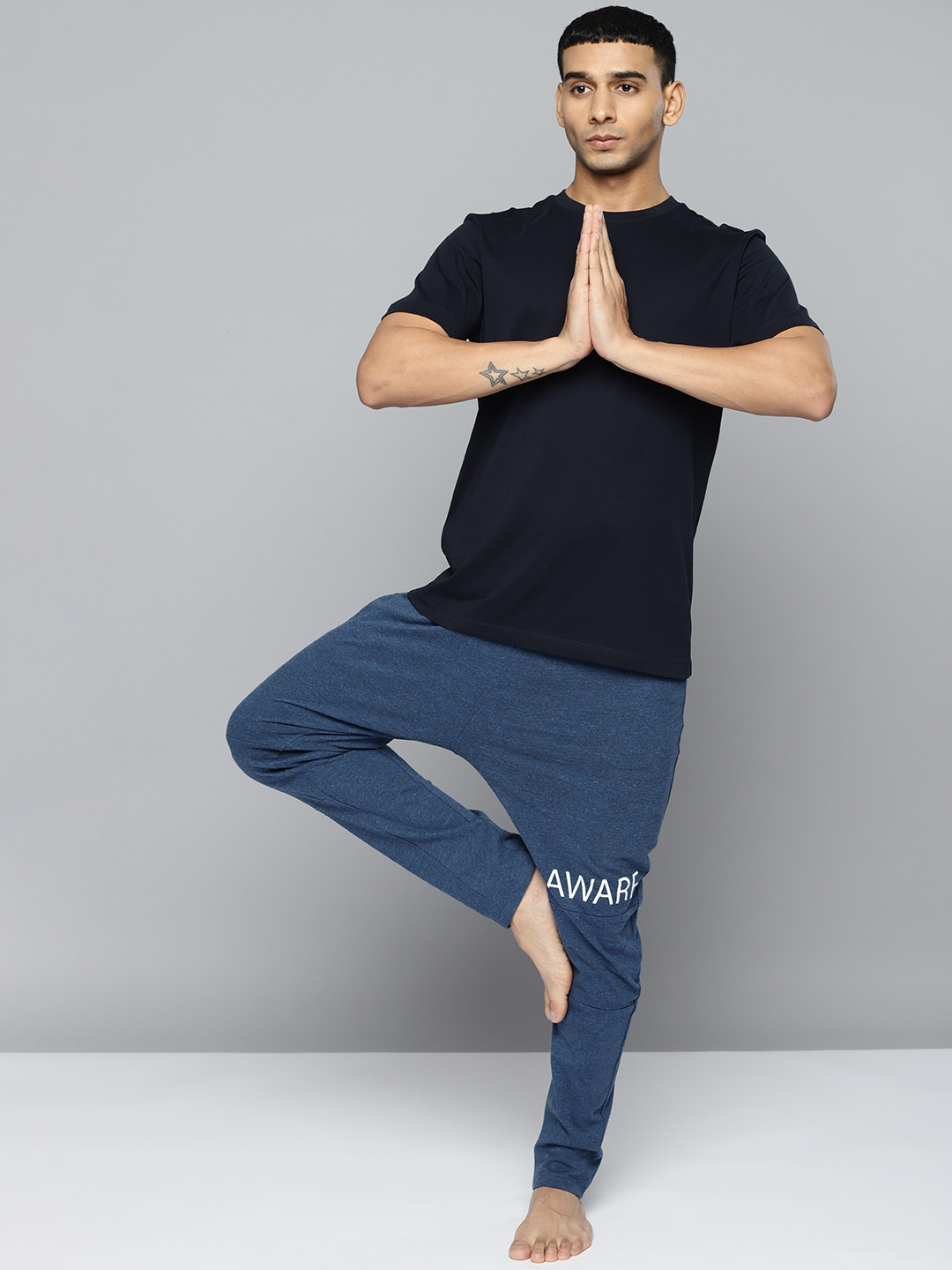 

HRX By Hrithik Roshan Men Navy Blue Melange Yoga Slim Fit Pure Cotton Sustainable Track Pants