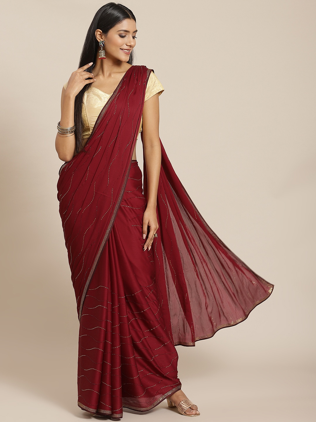 

Meena Bazaar Maroon Leheriya Sequinned Saree