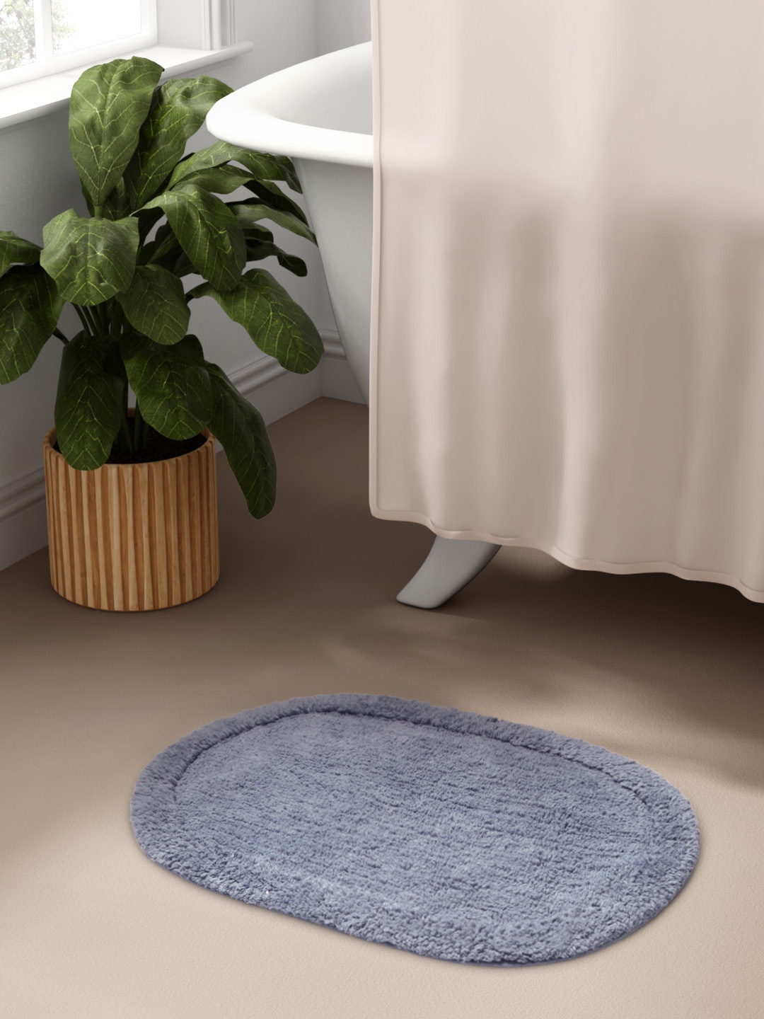 

Aura Blue Self Design 1300 GSM Cotton Oval Bath Rug